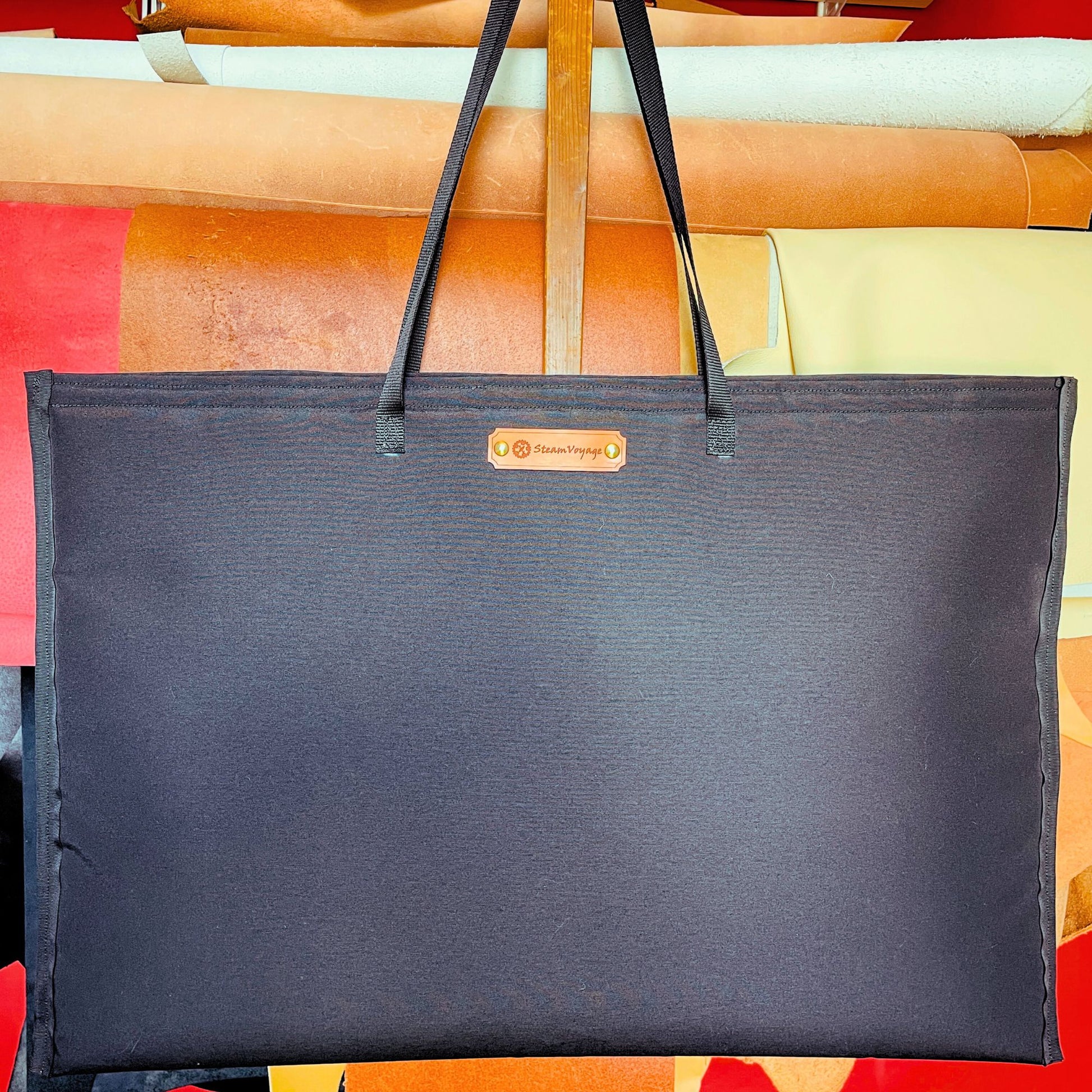 SteamVoyage-borsa in tessuto tempotest nero resistente imbottita con tracolle e rivestimento in raso nero