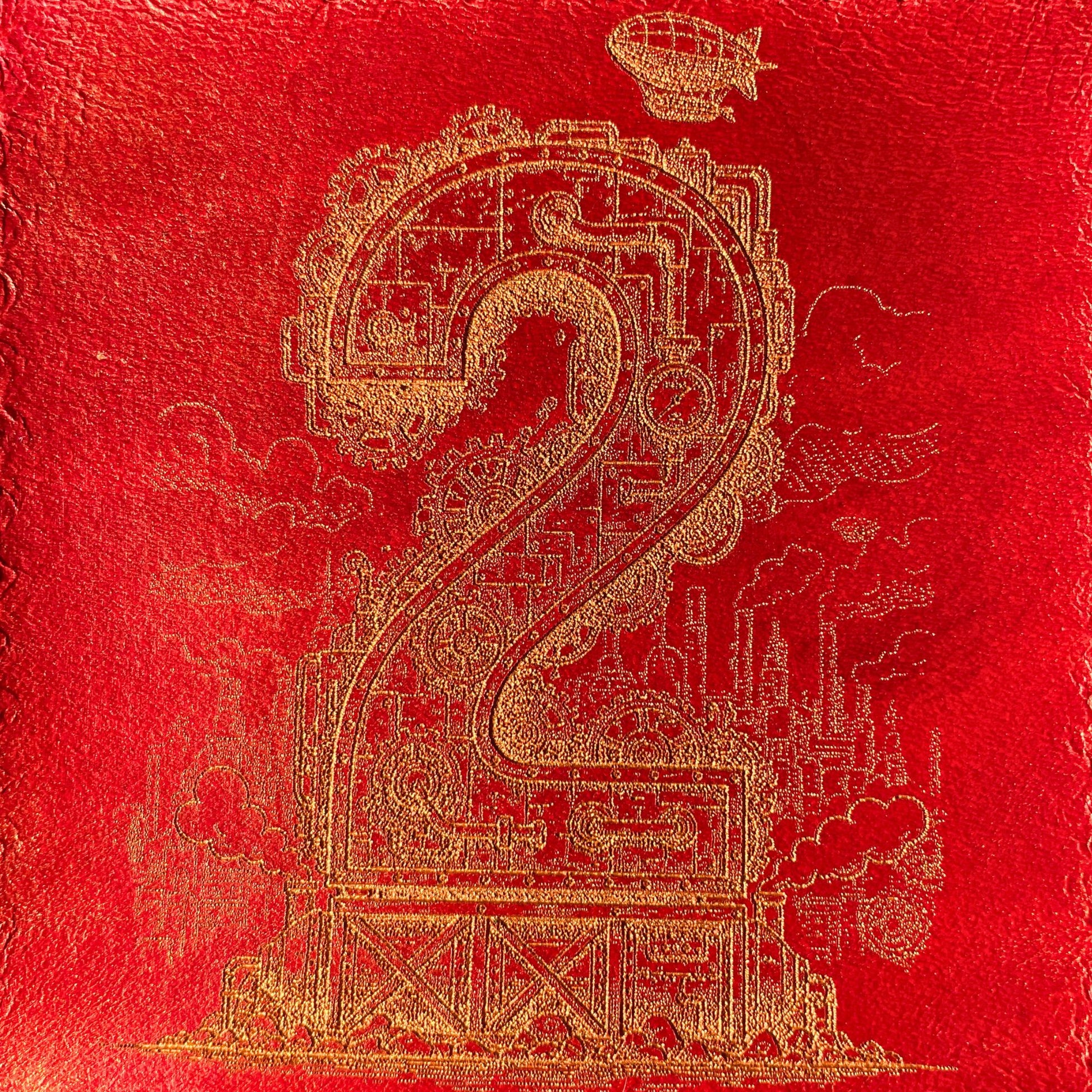 SteamVoyage - dado a sei facce in cuoio rosso cucito a mano con numeri dorati in stile steampunk incisi al laser 